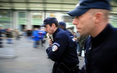 French police running at a railway station French police running at a railway station