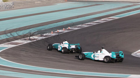 f1 race cars driving
