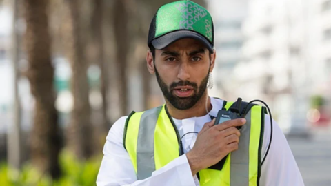 Dubai network industry user with a device