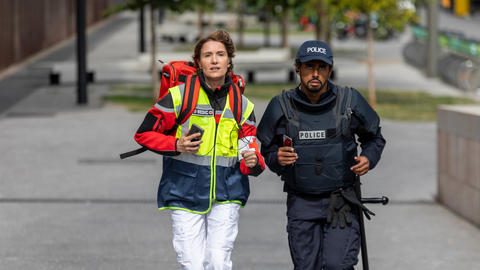 Medic and police running