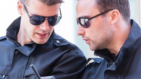 Serious security officers with Tactilon Dabat