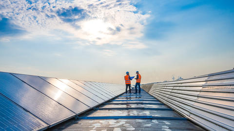 Industry workers on the roof