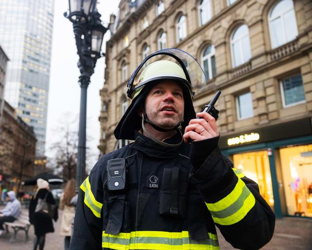 Fireman speaking to a TH9 TETRA terminal Fireman speaking to a TH9 TETRA terminal