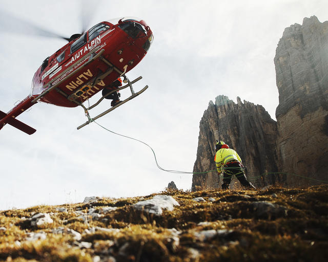 Medical evacuation helicopter landing to Tre Cime Italy Medical evacuation helicopter landing to Tre Cime Italy
