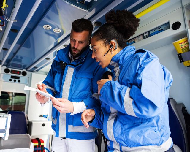 Paramedics doing a inventary inside a ambulance