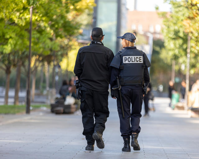 Police officer and security guard Police officer and security guard