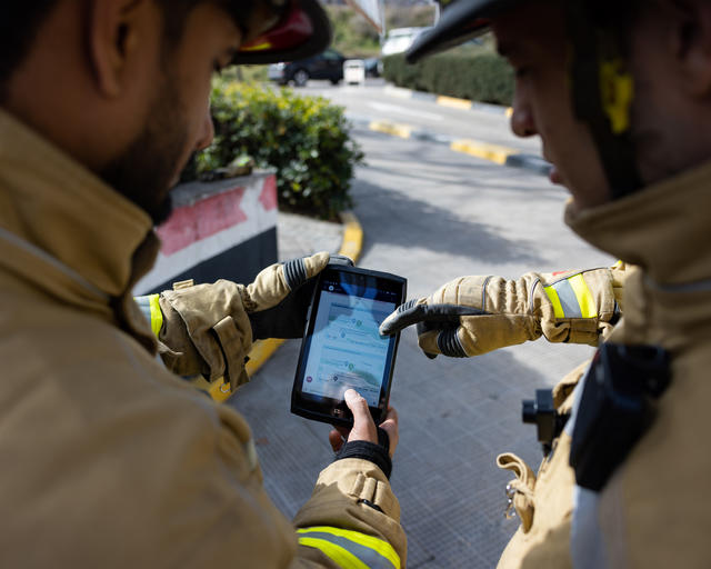 Firemen using agnet on a tablet Firemen using agnet on a tablet
