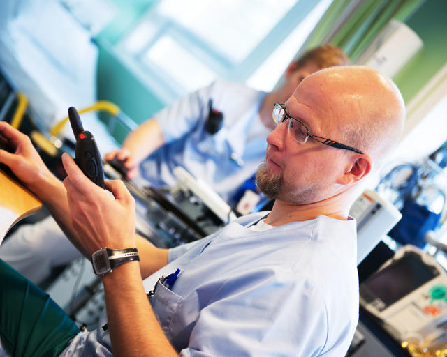 Paramedic communicating with his TMR880i Tetra terminal Paramedic communicating with his TMR880i Tetra terminal