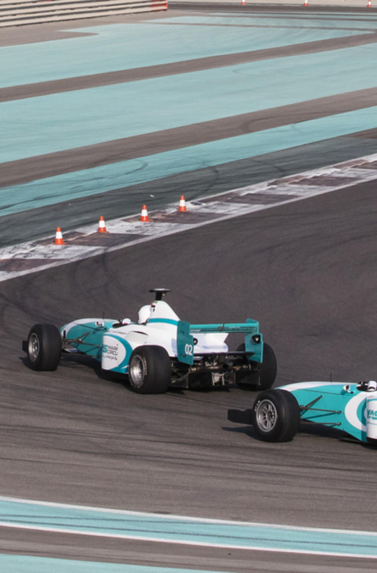 f1 race cars driving f1 race cars driving