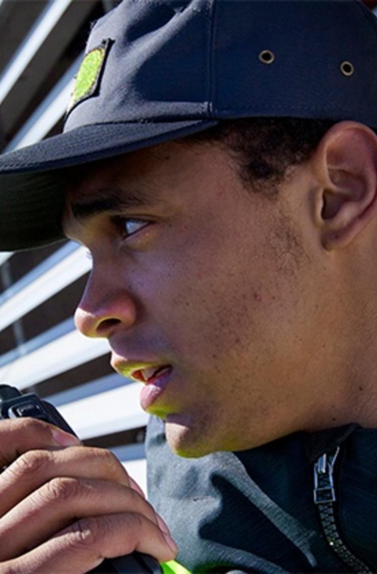 Security personnel uses PMR radio in DMO