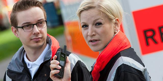 Fire and rescue professionals with TH1n radio