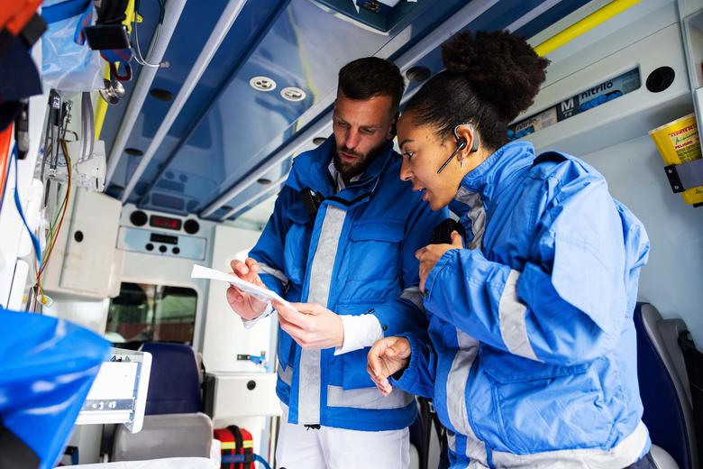 Paramedics doing a inventary inside a ambulance