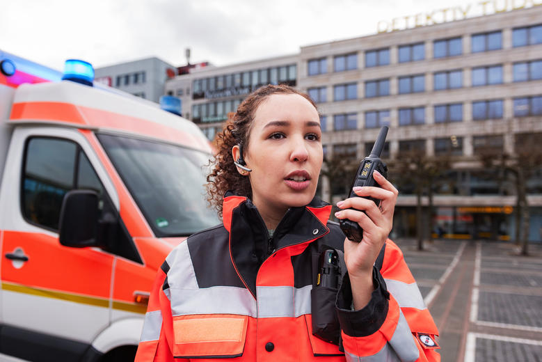 Paramedis speaking to a TH9 TETRA terminal