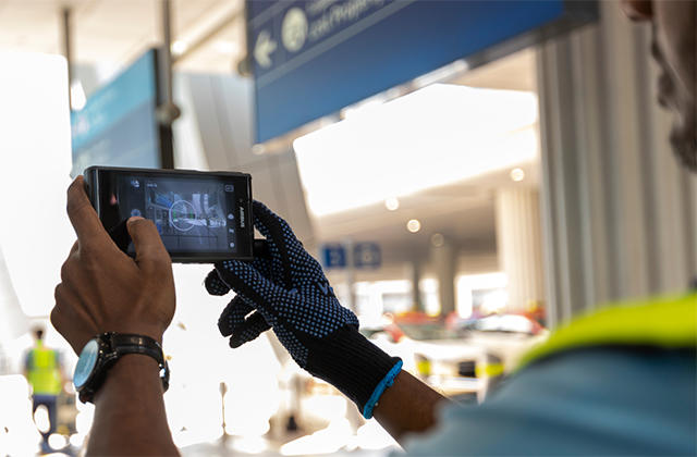 Airport personnel shooting video with Tactilon Dabat