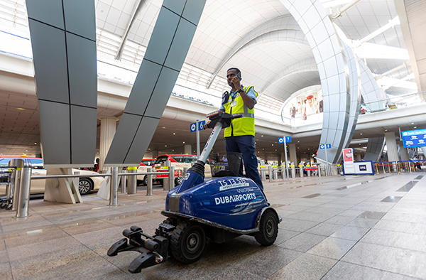 Dubai airport trolley staff