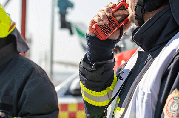 Fireman using thr9ex TETRA radio at Dubai airport Fireman using thr9ex TETRA radio at Dubai airport