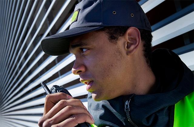 Security personnel uses PMR radio in DMO